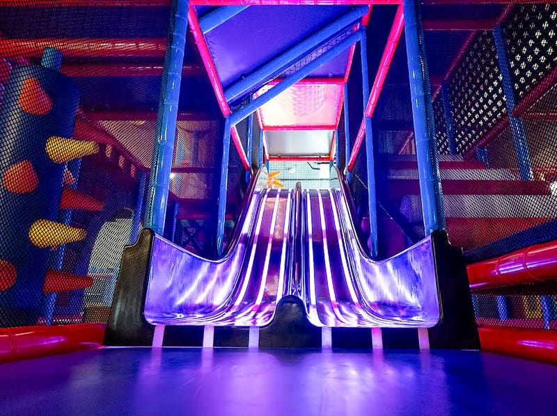 Multi-level castle slide inside Adventure Kingdom indoor playground near Dubrovnik