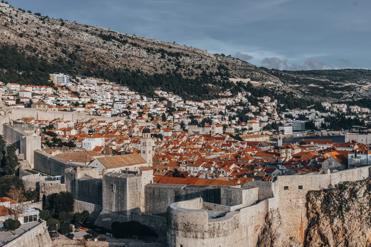 Dubrovnik City Walls above the terracotta rooftops of the Old Town